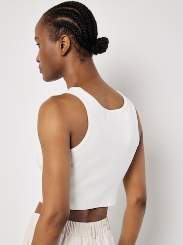 Haut ' ' Apricot en blanc