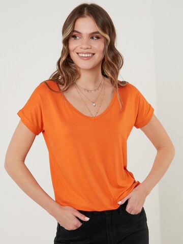 Maglietta di LELA in arancione: frontale