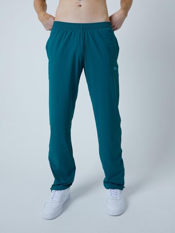 Regular Pantalon de sport 'Woven Training Pants' SPORTKIND en vert : devant