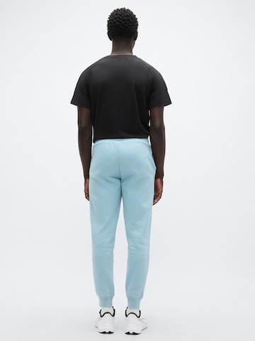 PUMA Regular Sportbroek 'ESS No. 1' in Blauw