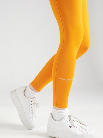 TOMMY HILFIGER Skinny Workout Pants 'ESSENTIAL' in Orange