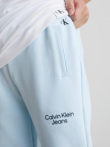 Calvin Klein Jeans - Regular Calças 'Stack' em azul