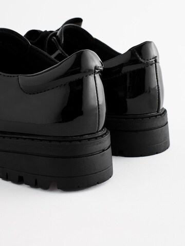 Next Flats in Black