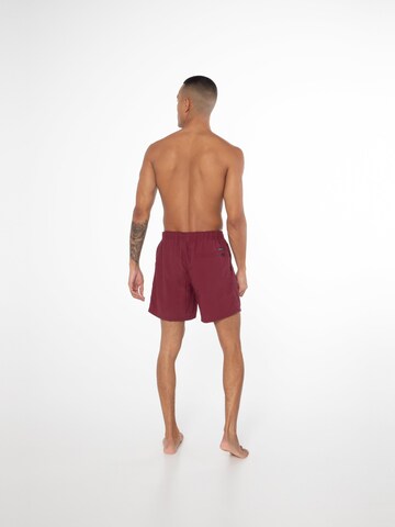 Shorts de bain 'Faster' PROTEST en rouge