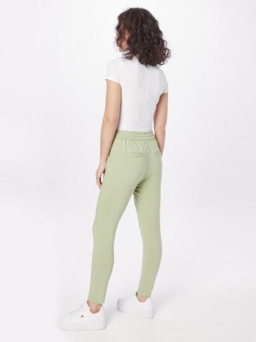 VERO MODA Zúžený Kalhoty se sklady v pase 'Eva' – zelená