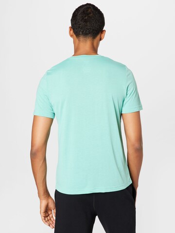 T-Shirt fonctionnel 'United by Fitness' Reebok en bleu