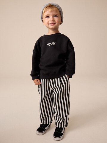 Next - Conjunto en negro