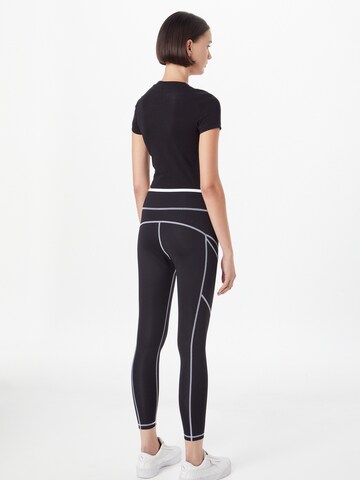 PUMA Skinny Sportbroek in Zwart