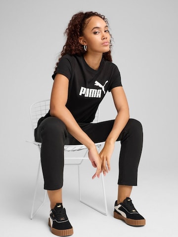 PUMA - Camiseta funcional 'Puma Ess No. 1 Logo Tee' en negro