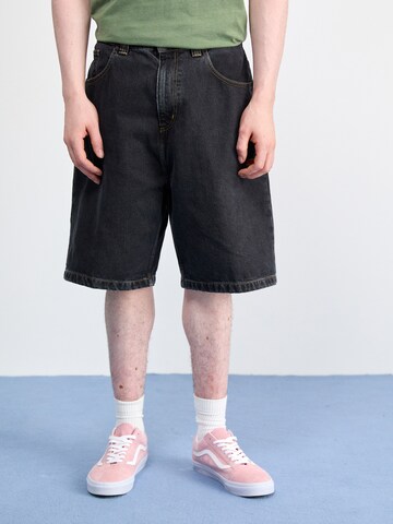 Carhartt WIP Avar lõige Teksapüksid 'Brandon', värv must: eest vaates