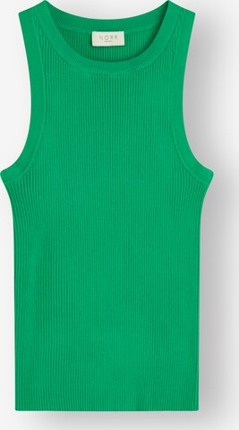 Top di NORR in verde: frontale