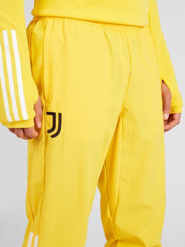 ADIDAS PERFORMANCE Tapered Sports trousers 'Juve' in Yellow