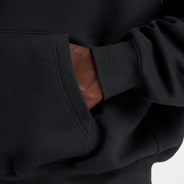 Veste de survêtement 'Trackside' new balance en noir