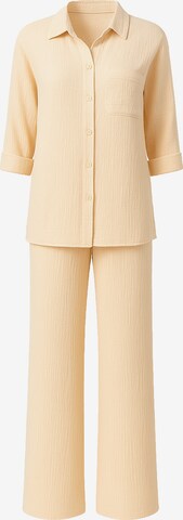 Elara Buksedragt i beige: forside