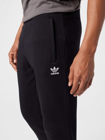 ADIDAS ORIGINALS Tapered Pants 'Adicolor Essentials Trefoil' in Black