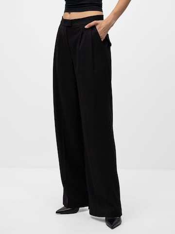 mandragora - Pierna ancha Pantalón 'Theo' en negro