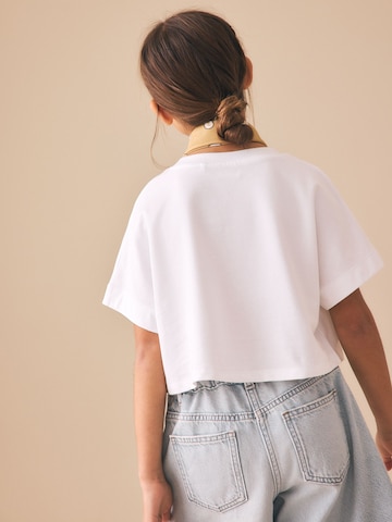 T-Shirt Next en blanc