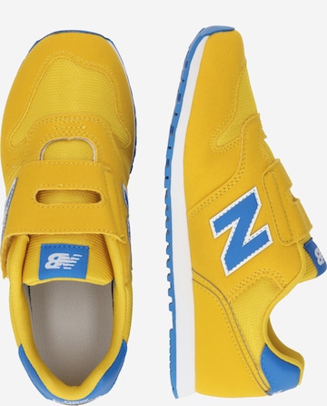 Sneaker '373' di new balance in giallo