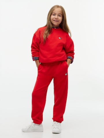 Effilé Pantalon TOMMY HILFIGER en rouge
