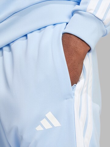 ADIDAS SPORTSWEAR Tapered Παντελόνι φόρμας 'TIRO' σε μπλε