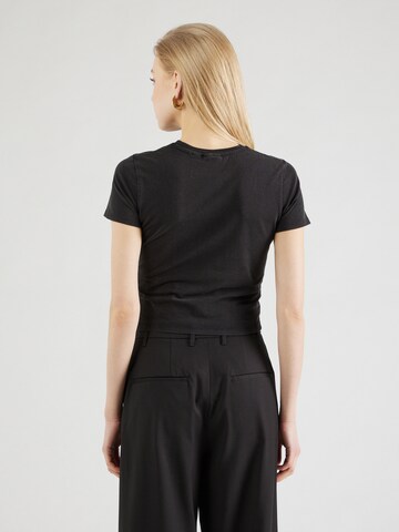 Maglietta di GUESS Originals in nero