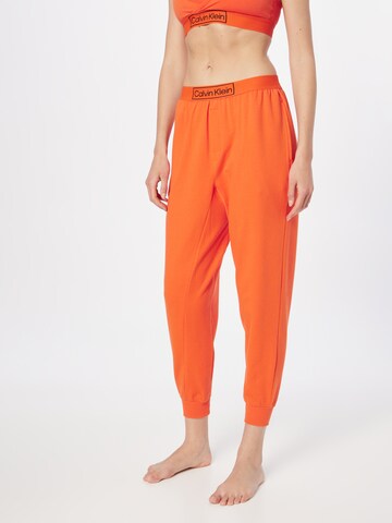 Calvin Klein Underwear Дънки Tapered Leg Панталон пижама в оранжево: отпред