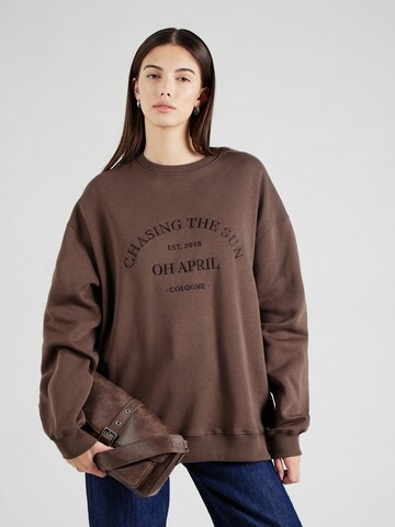 OH APRIL Sweatshirt 'Chasing' in Brown: front