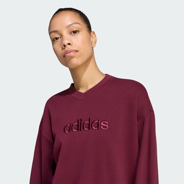ADIDAS SPORTSWEAR Urheilullinen collegepaita 'Seasonal Essentials' värissä punainen