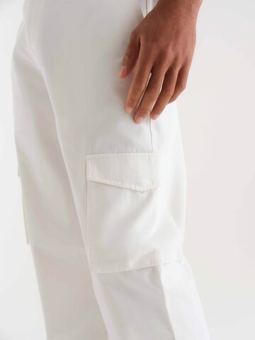 ABOUT YOU x Kevin Trapp Loose fit Cargo trousers 'Jaron' in White