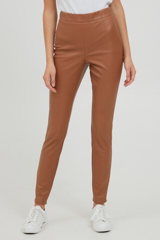 Oxmo Slimfit Leggings 'PAULINE' in Bruin: voorkant