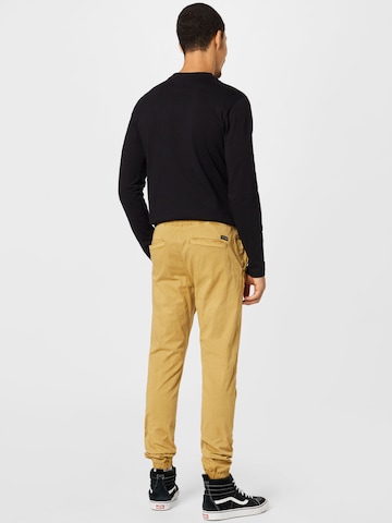 INDICODE JEANS Tapered Trousers 'Fields' in Yellow