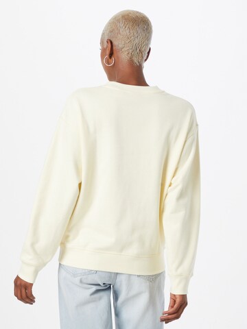 LEVI'S ® - Sweatshirt 'Graphic Standard Crewneck Sweatshirt' em amarelo