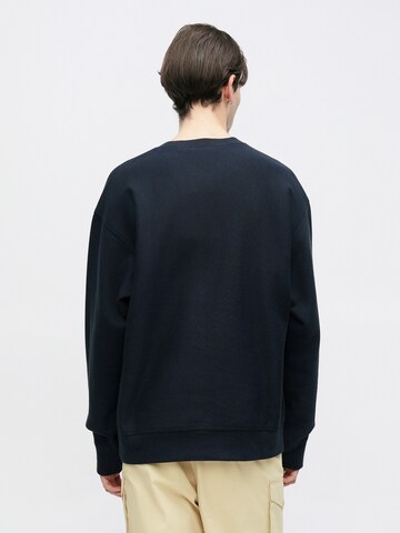 Carhartt WIP Bluzka sportowa 'American Script' w kolorze niebieski