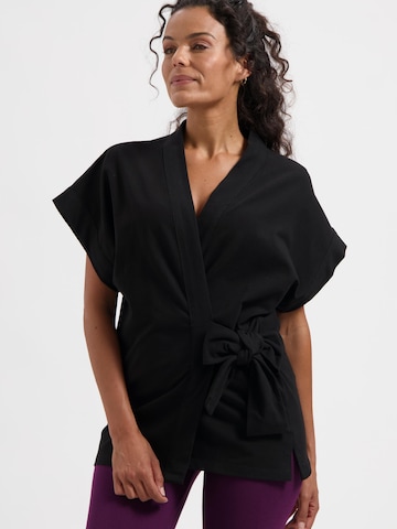 Urban Goddess Yoga & Activewear Sporttop 'Yumea Yoga & Pilates' in Schwarz