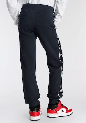 Effilé Pantalon de sport Champion Authentic Athletic Apparel en bleu