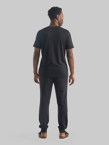 ICEBREAKER Slim fit Outdoor trousers 'Shifter' in Black