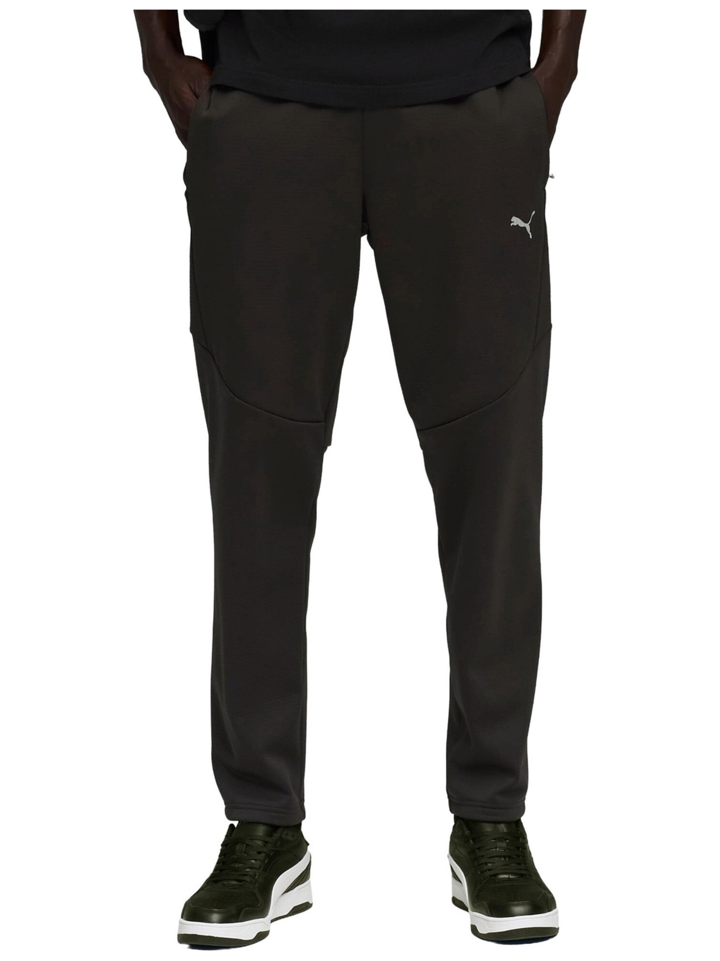 PUMA - regular Pantalón deportivo 'Puma Evostripe Warm Pants' en negro: frente