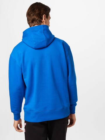 Tommy JeansSweater majica 'Modern Sport' - plava boja