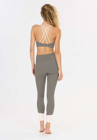 Athlecia Low support Sport bh 'Aspasia' in Groen