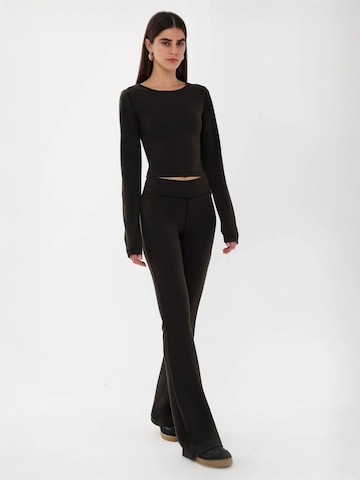 évasé Leggings 'Gamaschen' Hiccup en noir