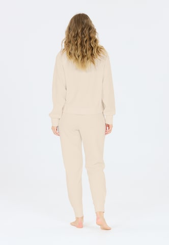 Athlecia Regular Sports trousers in Brown