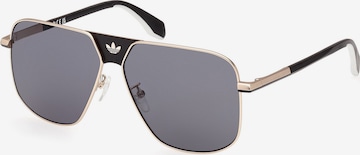 ADIDAS ORIGINALS Sunglasses in Gold: front