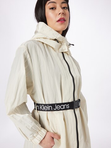 Calvin Klein Jeans Between-Seasons Coat in Beige