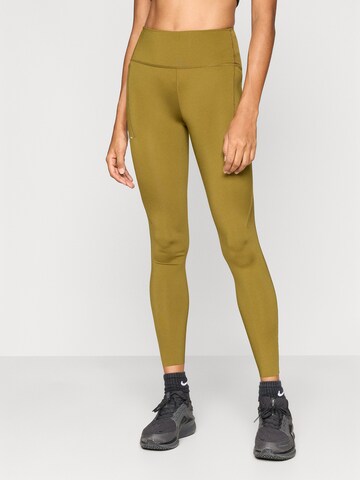 NIKE Skinny Športové nohavice 'SWIFT' - Zelená: predná strana