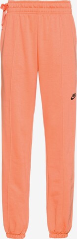 Nike Sportswear Tapered Broek in Oranje: voorkant