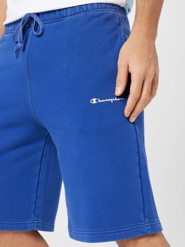 Champion Authentic Athletic Apparel Lużny krój Spodnie w kolorze niebieski