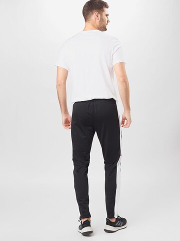 Coupe slim Pantalon de sport Reebok en noir