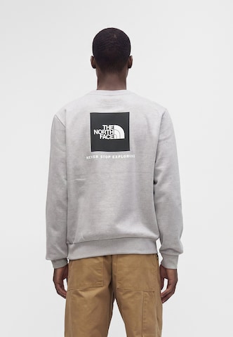 THE NORTH FACE Sweatshirt 'EVOLUTION' in Grijs: voorkant