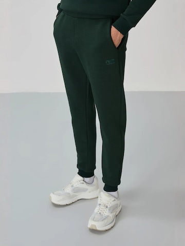 Tommy Life Joggingpak in Groen