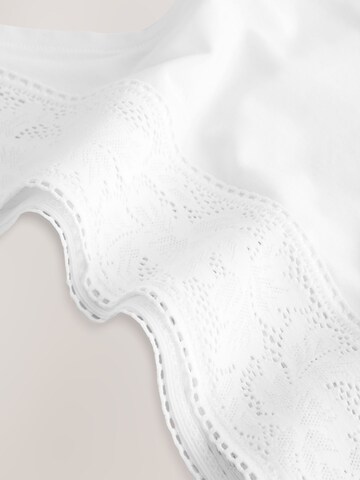 String Next en blanc